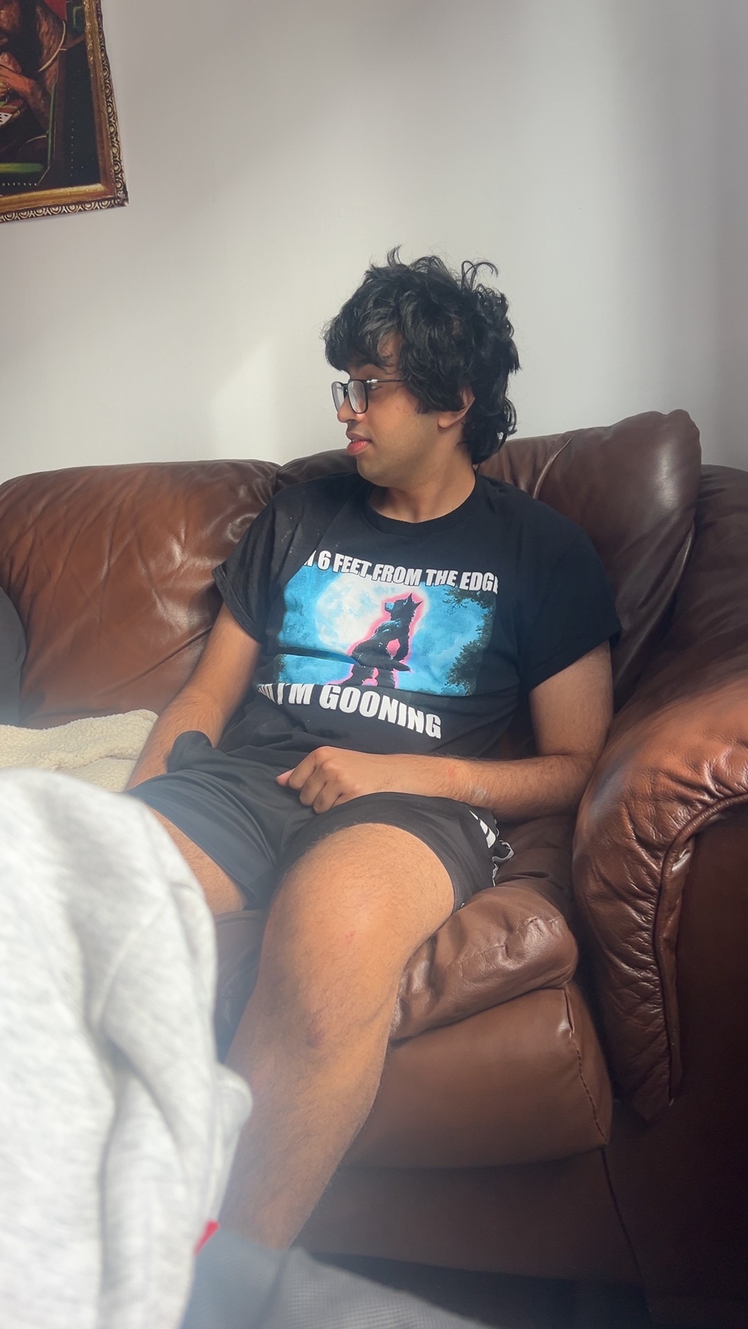 Harris Noon sitting on a couch