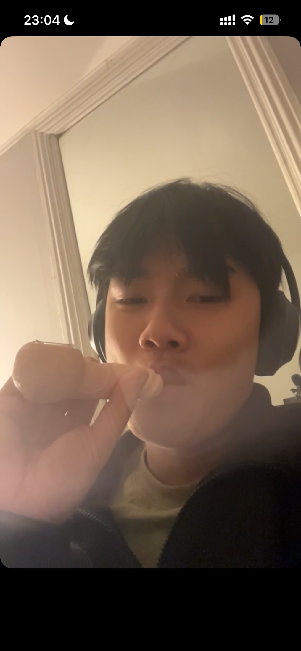 Jacob Wong wearing a headset